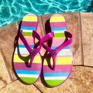 Coach “Trixie” purple & multicolor striped thong sandals.